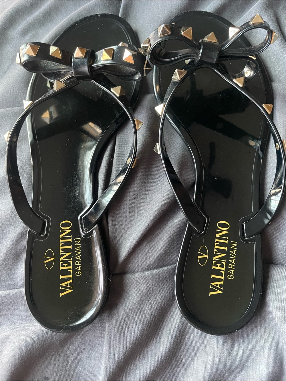 Valentino Garavani Black Jelly Bow Sandals with Gold Studs